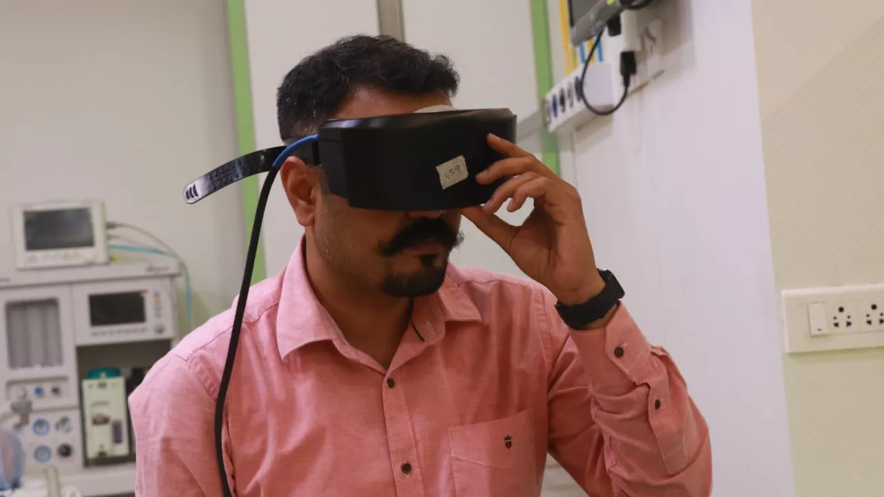 Dr. Prateek Porwal wearing VNG (Videonystagmography) goggles to demonstrate vestibular testing at Prime ENT Center, Hardoi