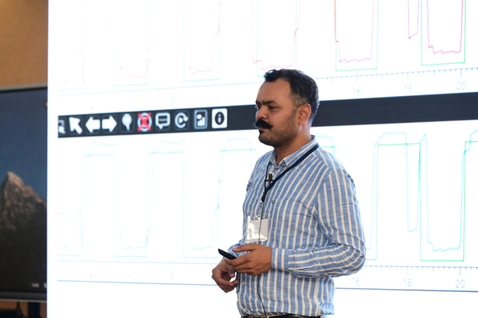 Dr. Prateek Porwal presenting clinical material at the International Balance Symposium, Yenepoya University — BPPV and vertigo specialist