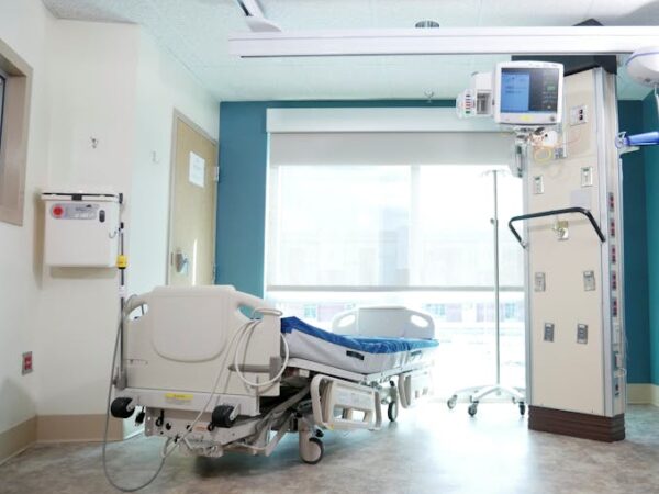 Hospital room with adjustable patient bed and medical equipment — ਬੈਲੰਸ ਕਸਰਤ | Dr. Prateek Porwal, ENT