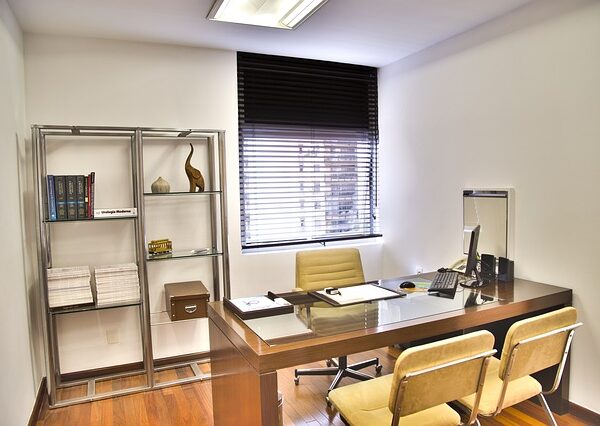 A clean, modern doctor's office with desk and chairs — Bilateral Vestibulopathy | Dr. Prateek Porwal, ENT