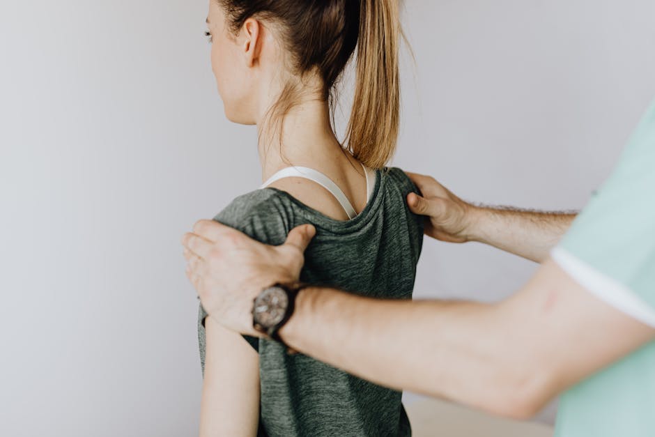 Hands on patient's shoulders and neck for examination or therapy — can vestibular neuritis come | Dr. Prateek Porwal, ENT
