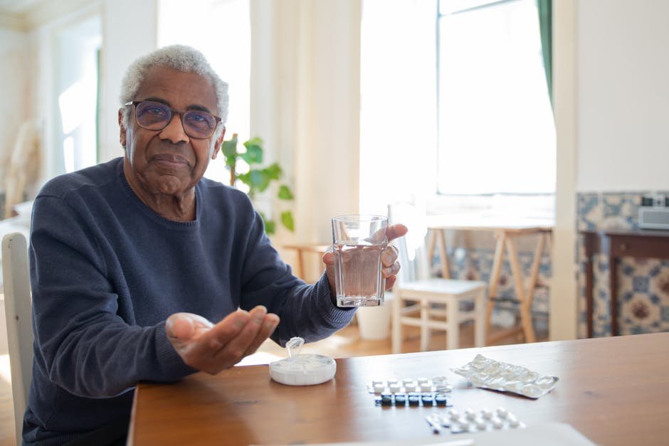 Elderly man holding pills and glass of water — ચક્કર આવતું હોય તો શું ખાવું | Dr. Prateek Porwal, ENT