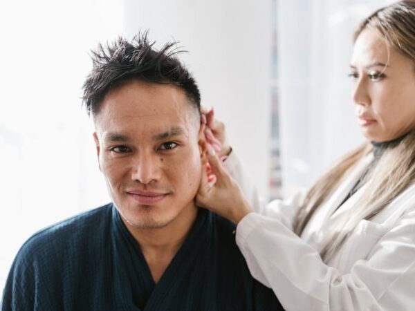 Doctor examining a patient's ear — ચક્કરના ઘરેલુ ઉપચાર | Dr. Prateek Porwal, ENT