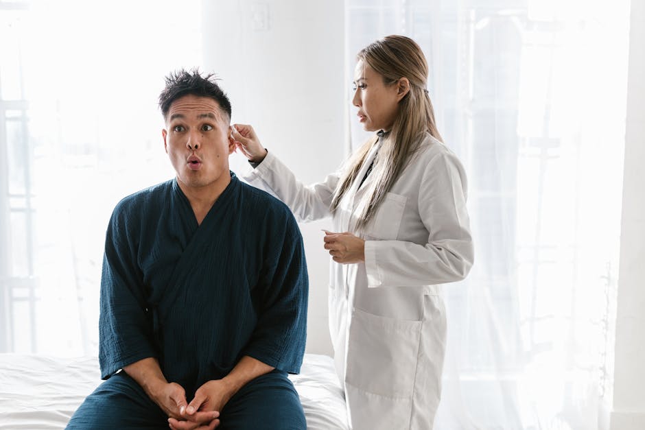 Doctor examining patient's ear with a cotton swab — चक्कर येण्यावर घरगुती उपाय | Dr. Prateek Porwal, ENT