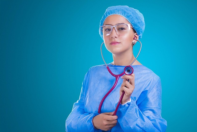 Doctor in surgical gown and cap holding a stethoscope — ENT Specialist Barabanki | Dr. Prateek Porwal, ENT