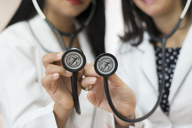 Two doctors holding stethoscopes towards the camera — ENT Specialist Etawah | Dr. Prateek Porwal, ENT