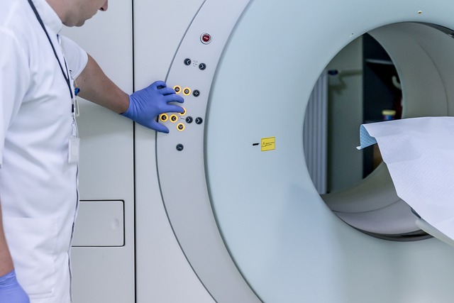Medical professional operating CT scanner for imaging procedures — ENT Specialist Sitapur | Dr. Prateek Porwal, ENT