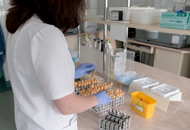 Medical professional handling test tubes in a laboratory setting — Epley Maneuver ઘરે કેવી રીતે કર… | Dr. Prateek Porwal, ENT