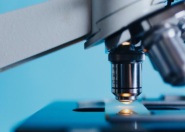 Close-up of a microscope objective lens and stage — Epley Maneuver | Dr. Prateek Porwal, ENT