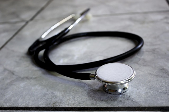 A black stethoscope lies on a tiled surface — गर्मी और बरसात में चक्कर | Dr. Prateek Porwal, ENT