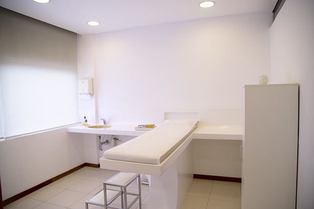 A clean examination room with a bed and sink — half somersault maneuver | Dr. Prateek Porwal, ENT