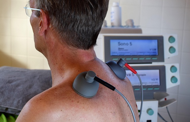 Patient receiving ultrasound therapy on shoulder and neck — horizontal canal bppv | Dr. Prateek Porwal, ENT
