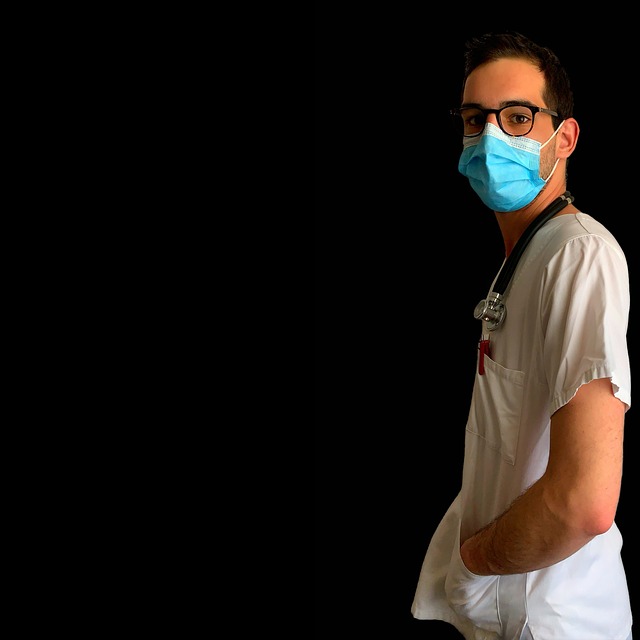 Doctor wearing a mask and stethoscope, looking to the side — mal de debarquement syndrome | Dr. Prateek Porwal, ENT