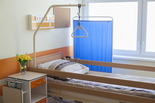 Hospital room with a bed, bedside table, and grab bar — ভারসাম্য ব্যায়াম | Dr. Prateek Porwal, ENT