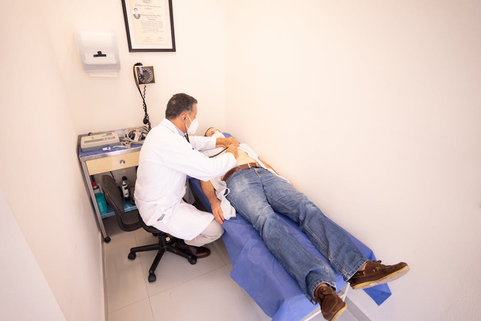 Doctor examines patient lying on examination table with stethoscope — शुगर और BP से चक्कर | Dr. Prateek Porwal, ENT