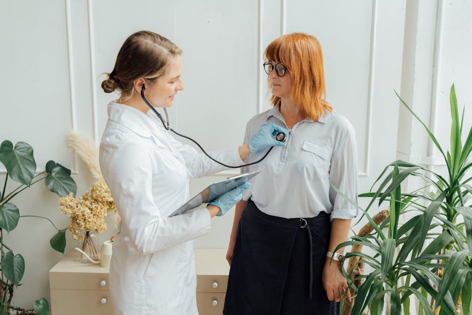 Doctor using stethoscope to examine patient's chest — vertigo and BPPV hub | Dr. Prateek Porwal, ENT