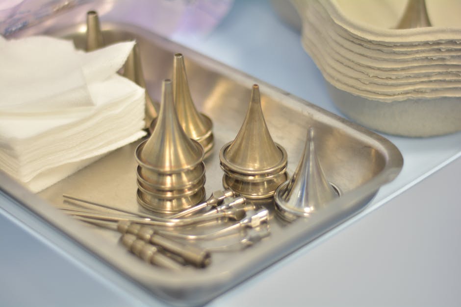 Medical instruments for ear and nose examination on a tray — चक्कर faq | Dr. Prateek Porwal, ENT