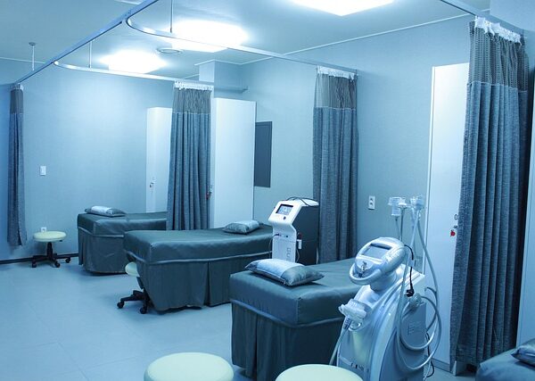 Medical treatment room with beds and specialized equipment — Vertigo Doctor in Agra | Dr. Prateek Porwal, ENT