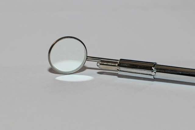 Close-up of a medical mirror on a white background — Vertigo Doctor in Shahjahanpur | Dr. Prateek Porwal, ENT