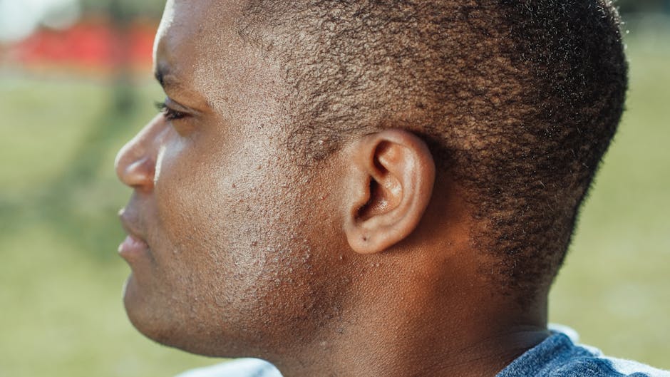 Close-up profile of a man's head showing his ear — vestibular migraine symptoms | Dr. Prateek Porwal, ENT