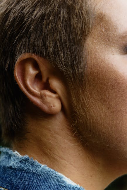 Close-up of a human ear and side of head — vestibular neuritis | Dr. Prateek Porwal, ENT