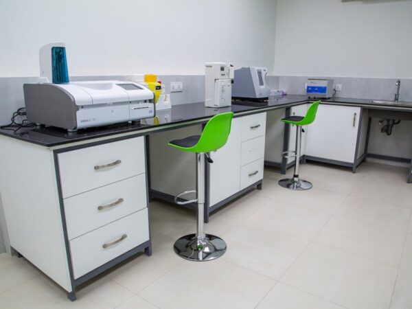 Laboratory equipment with analyzers, stools, and sink — vng टेस्ट चक्कर | Dr. Prateek Porwal, ENT